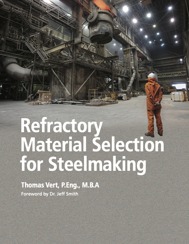 A steelmaking plant with a worker in safety gear observing refractory materials in an industrial setting.