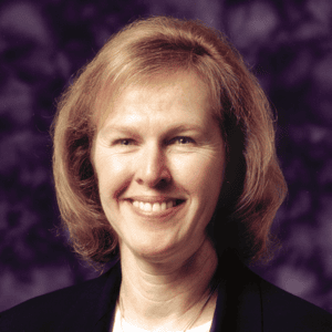 Portrait of Dr. Kathleen Taylor, ACerS past president, smiling warmly.