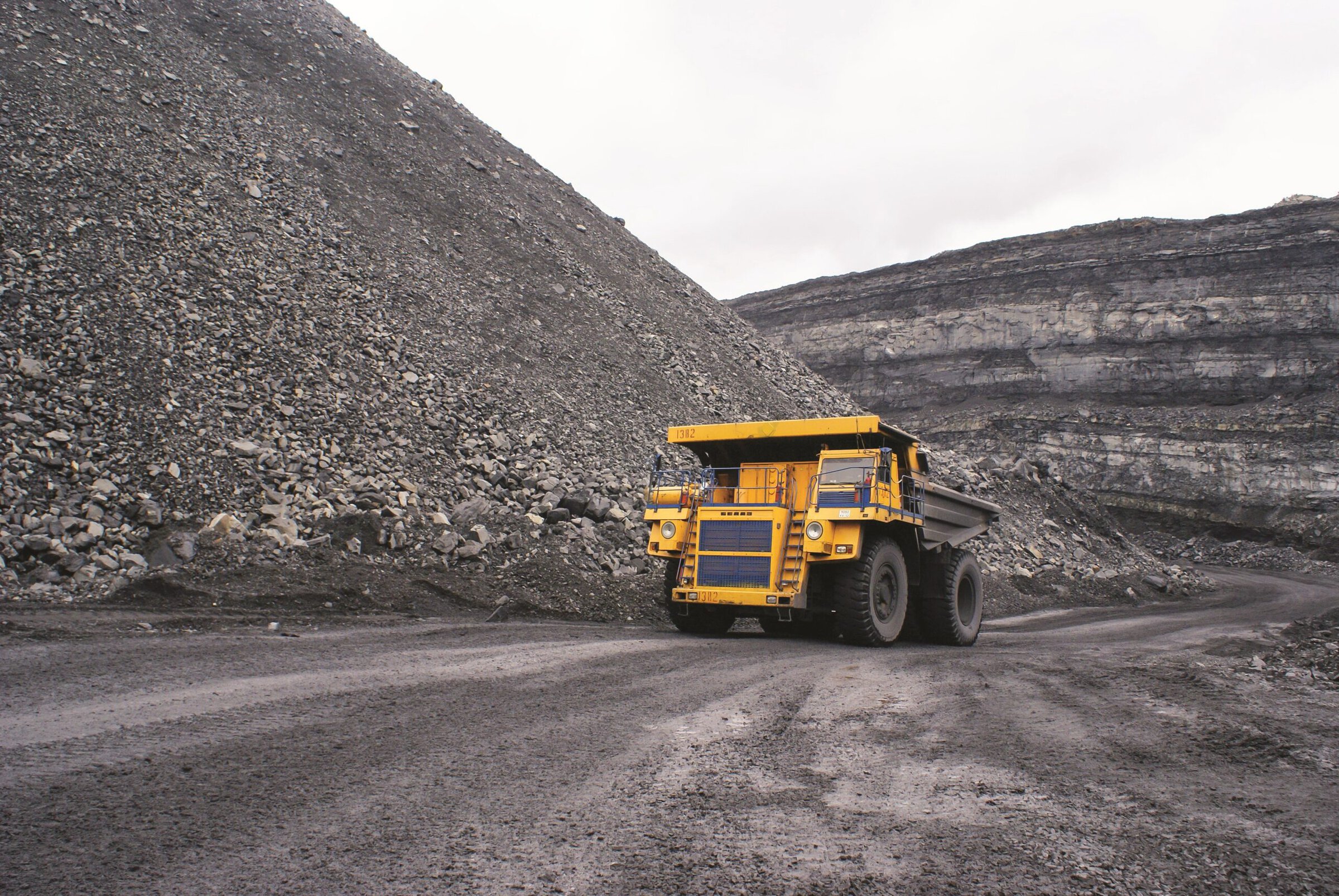 Construction vehicle surrounded by mining area