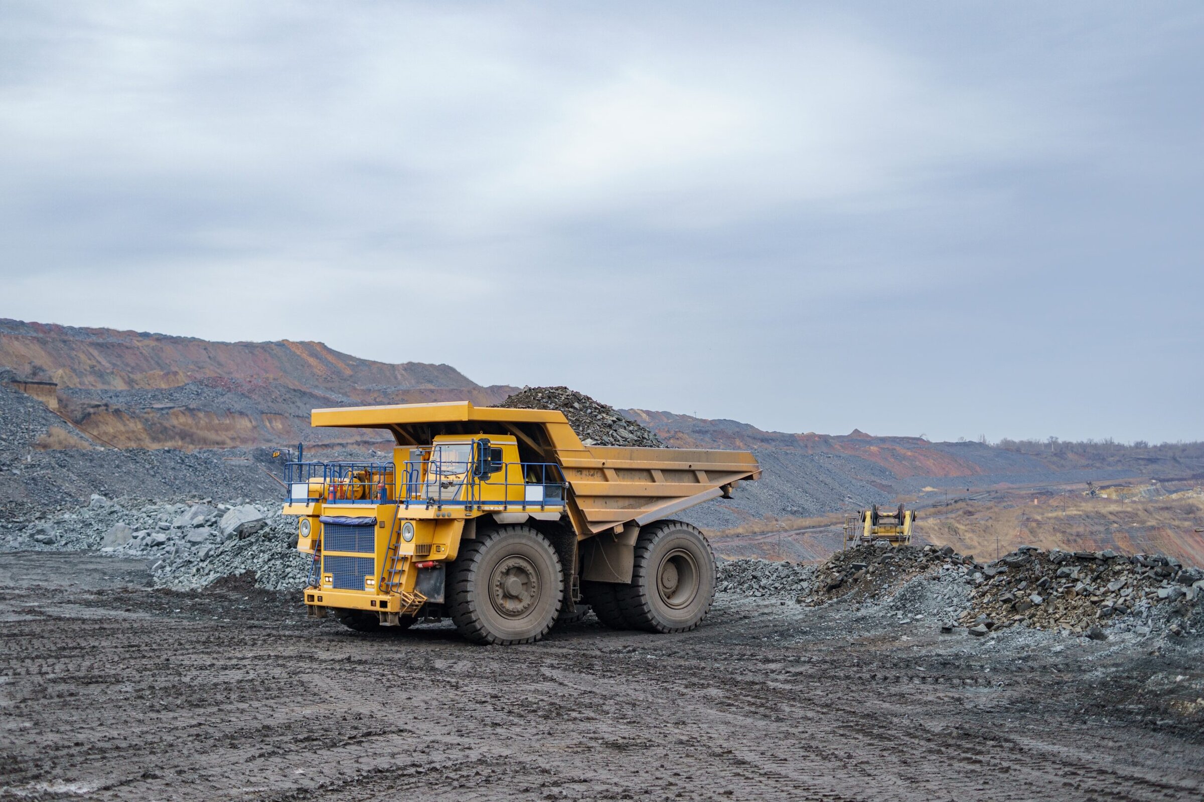 Construction vehicle surrounded by mining area