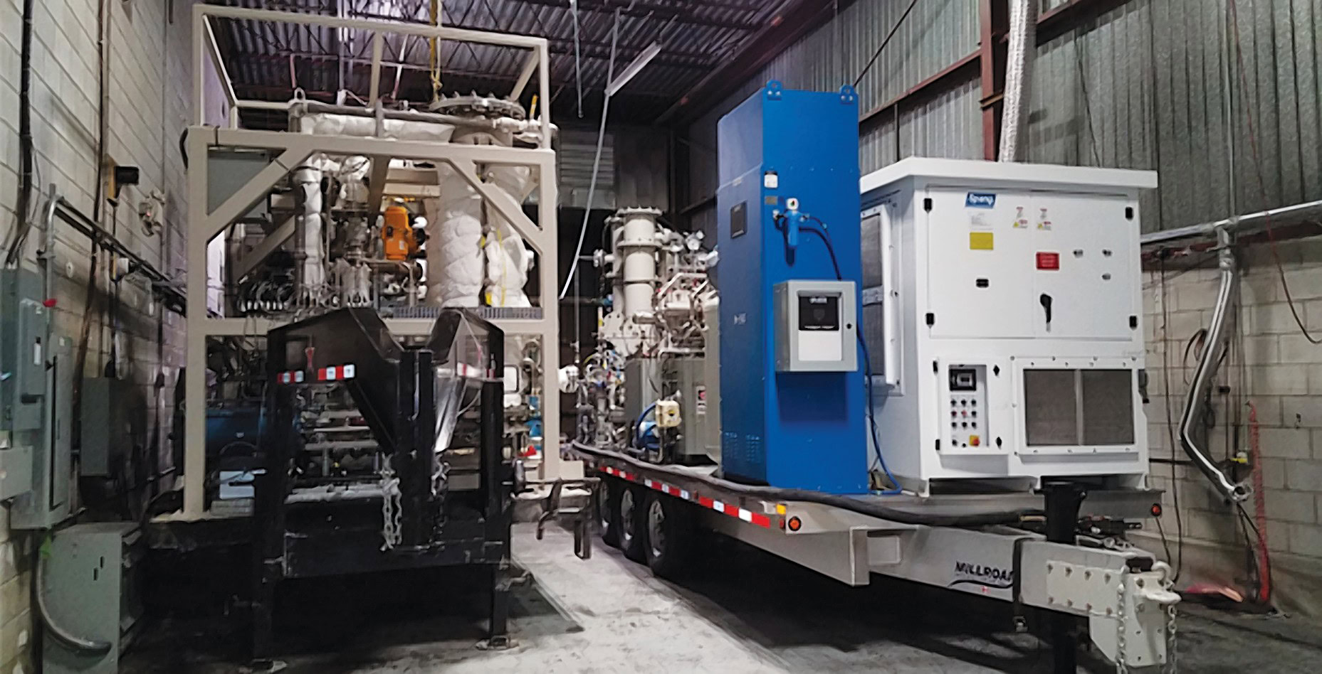 A soil scrubber to clean chemical warfare agents, left, was developed for DARPA by the Southwest Research Institute, San Antonio, Texas. <em>Credit: DARPA</em>