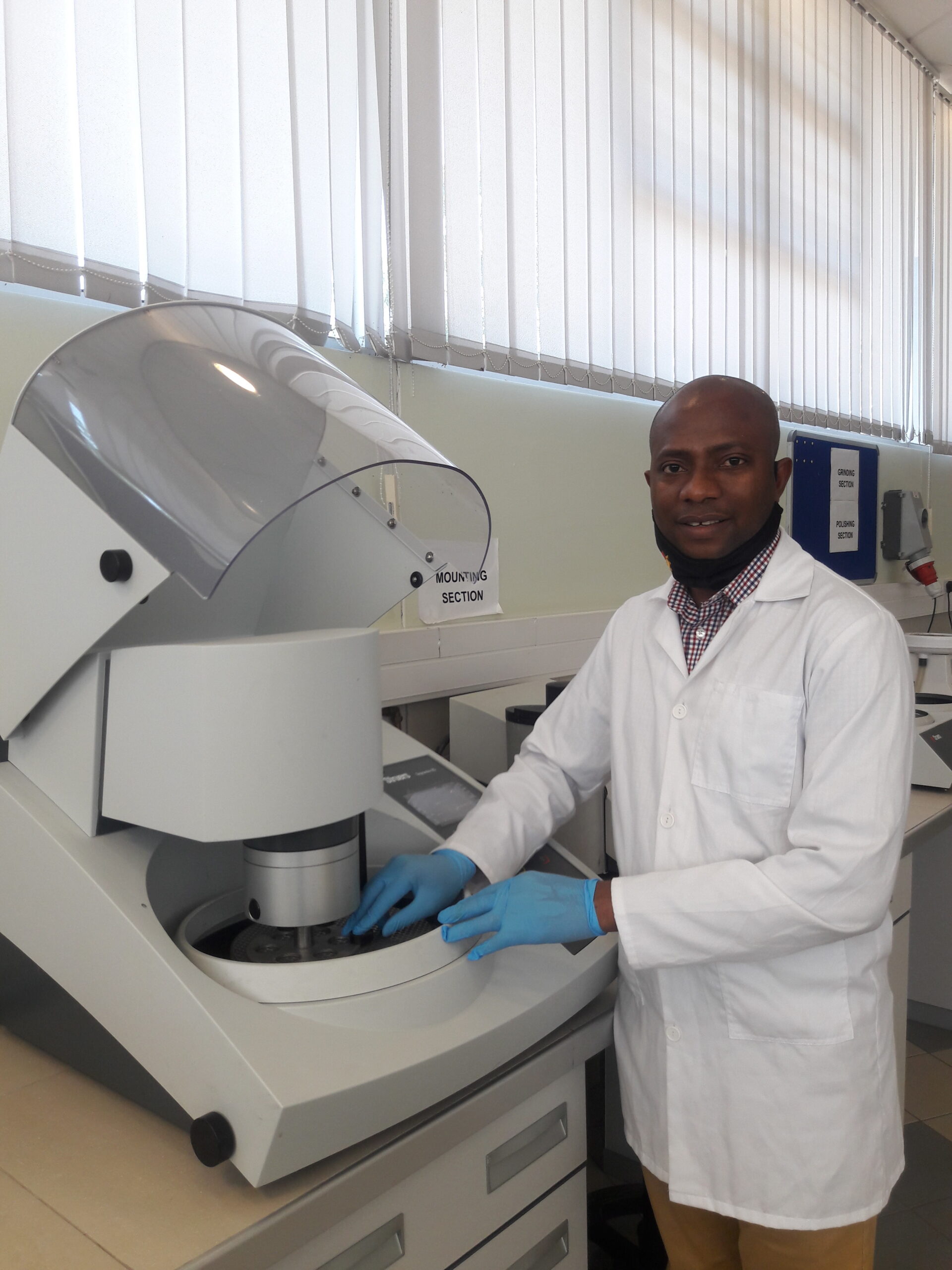 High-tech ceramic research laboratory with a scientist operating advanced testing equipment.