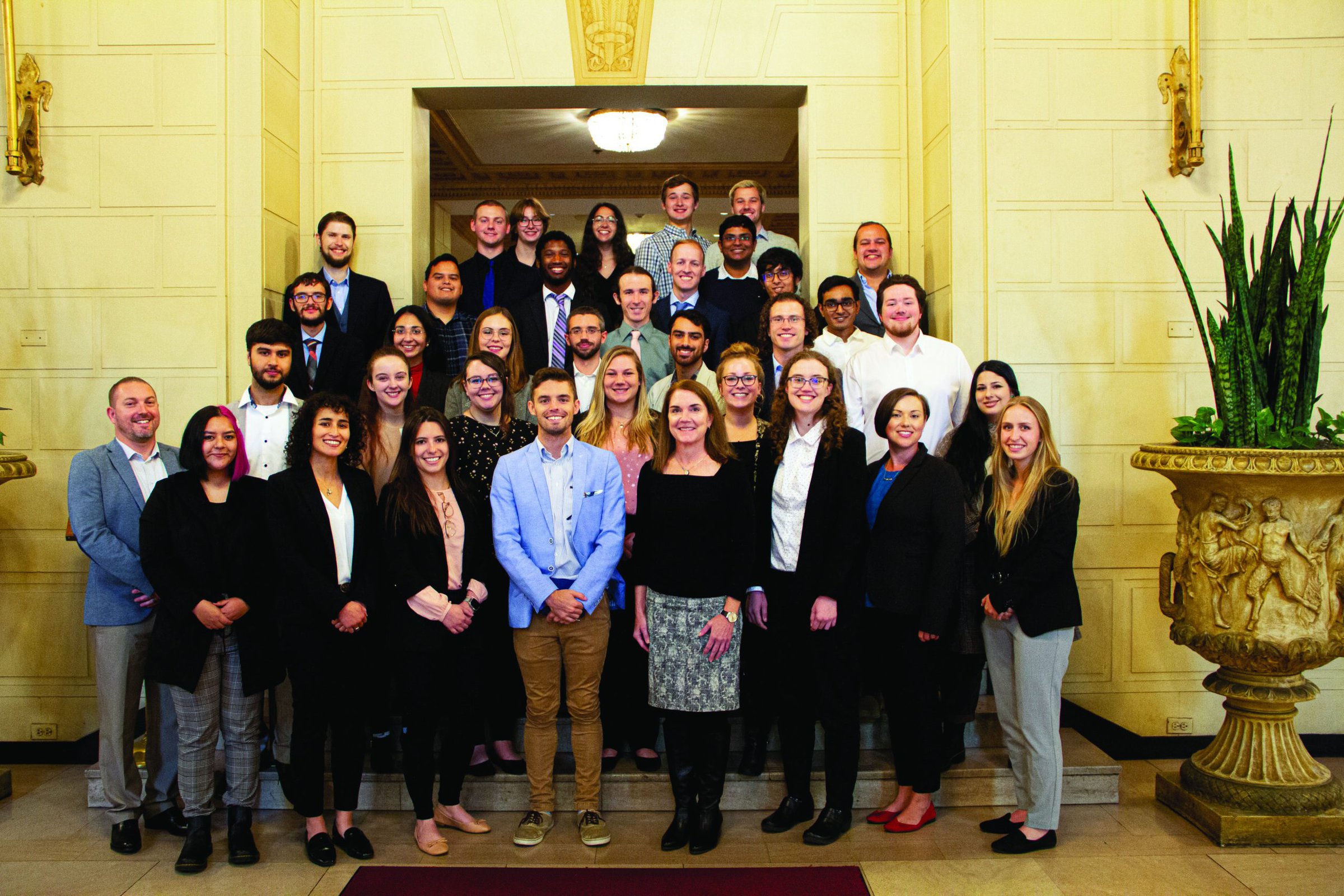 2022–2023 PCSA delegates at the PCSA annual meeting in October 2022. PCSA chair Fox Thorpe (center with blue jacket) stands with then-ACerS president Beth Dickey (right of Thorpe). <em>Credit: ACerS</em>