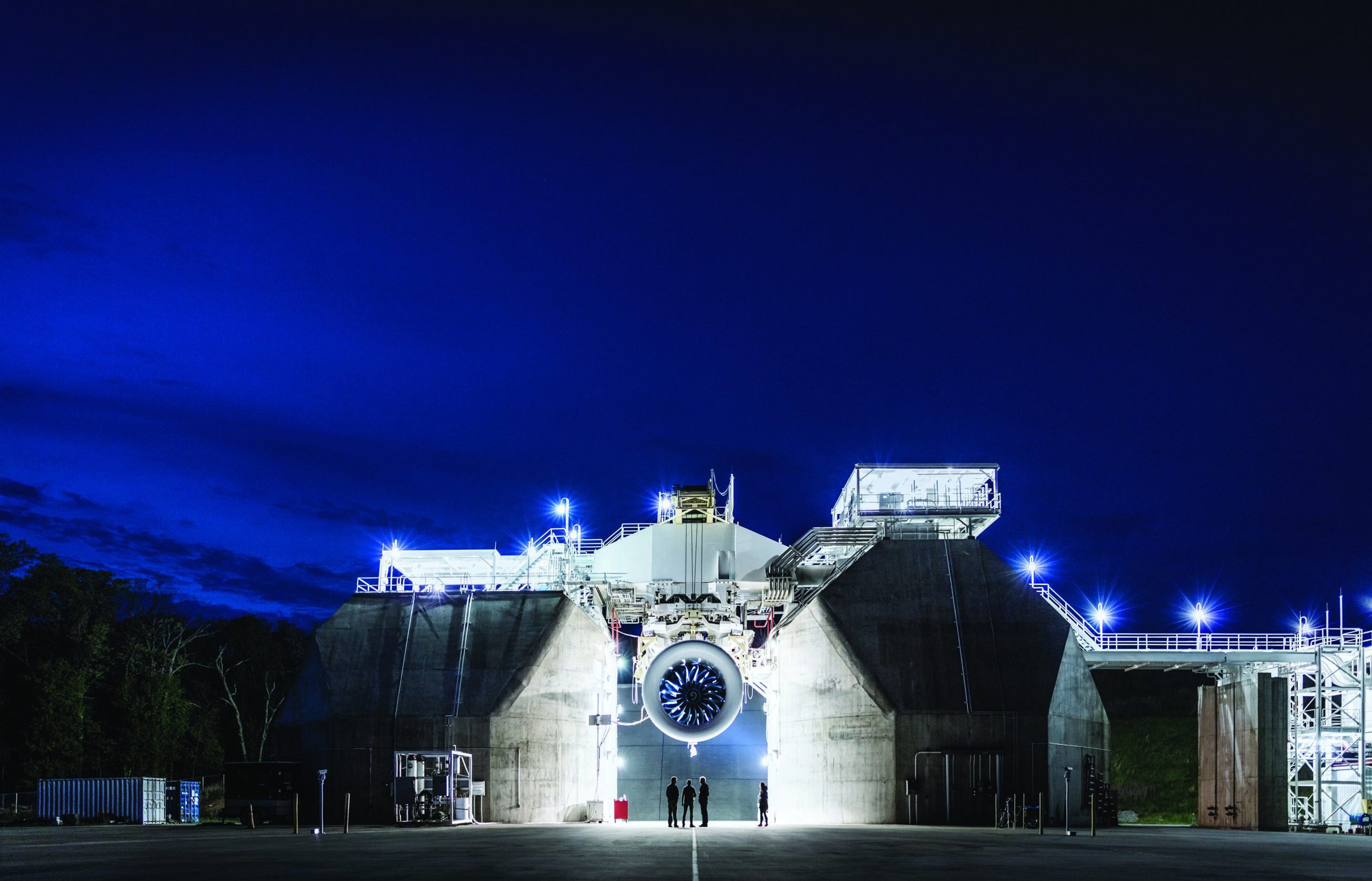Advanced ceramic manufacturing facilities at night, modern industrial architecture, Ceramics research center, high-tech materials production.