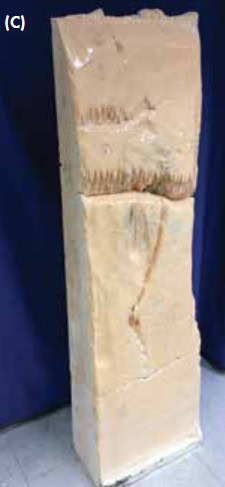 High-quality ceramic or geological stone sample displayed vertically for material analysis and research.