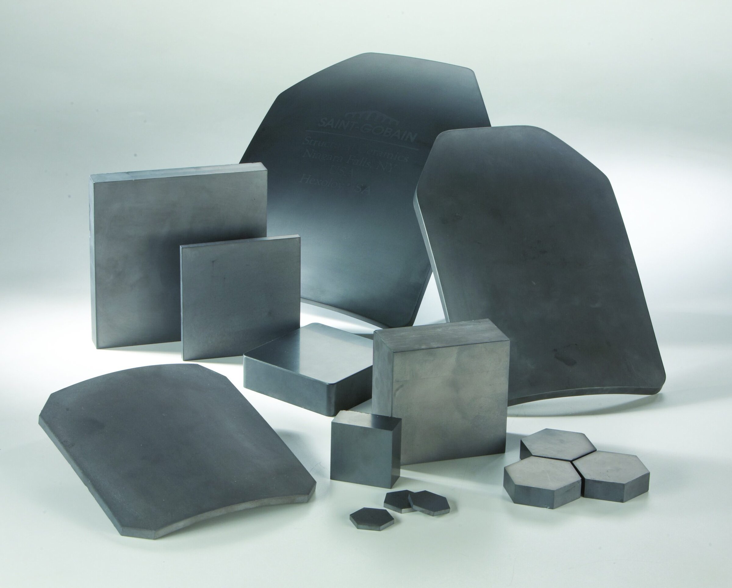 Polished ceramic and metal test tiles for advanced materials research.