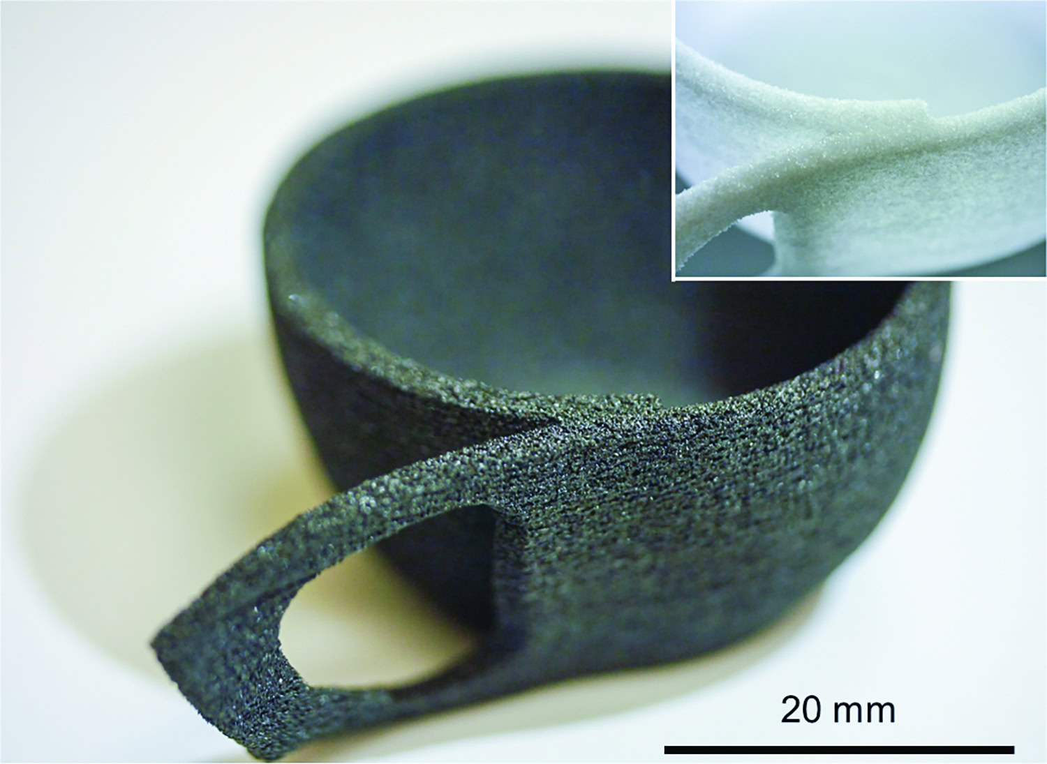 Teal-colored 3D-printed coffee cup