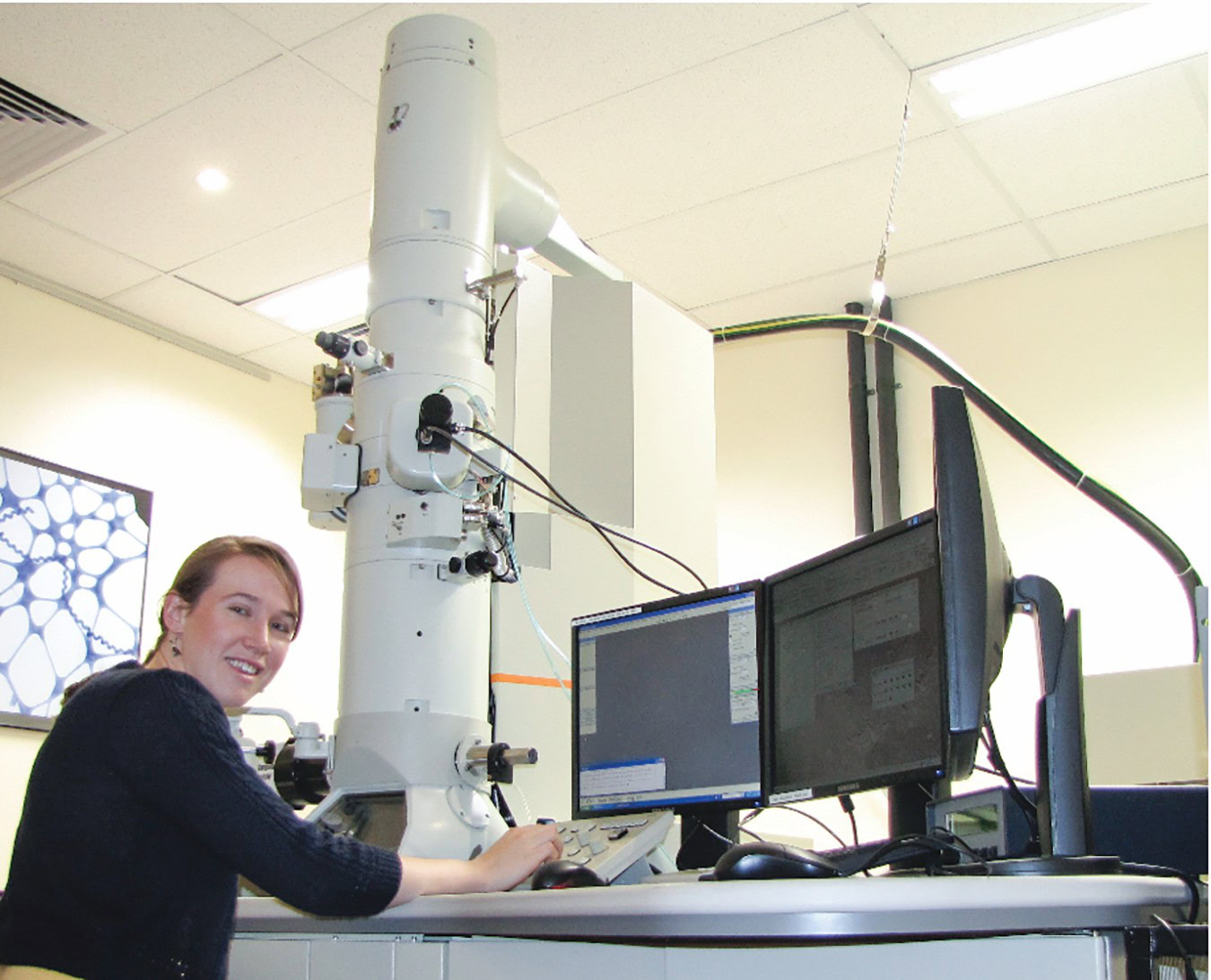 High-tech ceramic materials research laboratory with electron microscopy equipment.