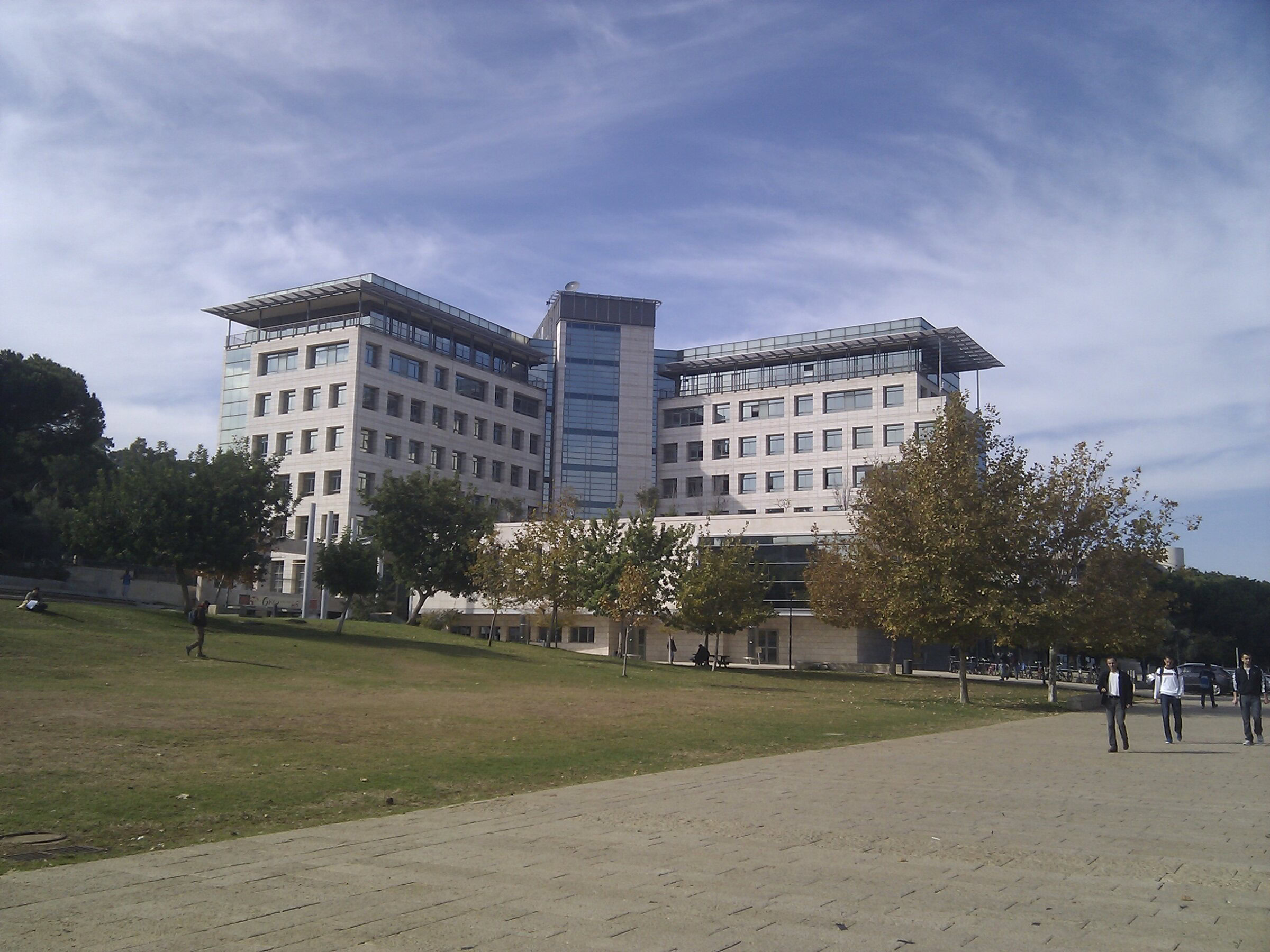 Technion Israel's modern building on campus lawn, relevant to the materials market in Israel.