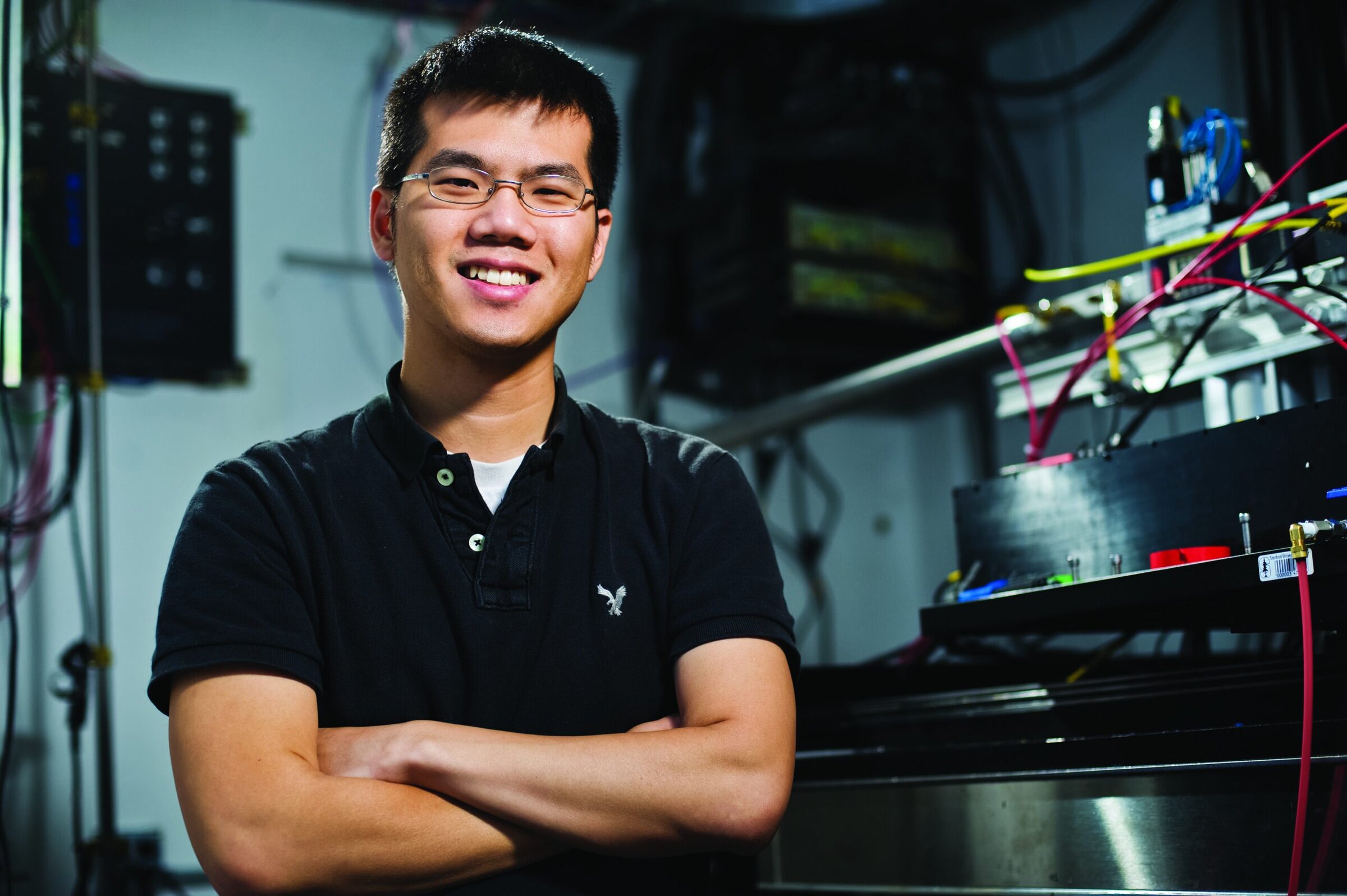 Innovative ceramic engineering student working in a laboratory with advanced equipment for ceramics research.