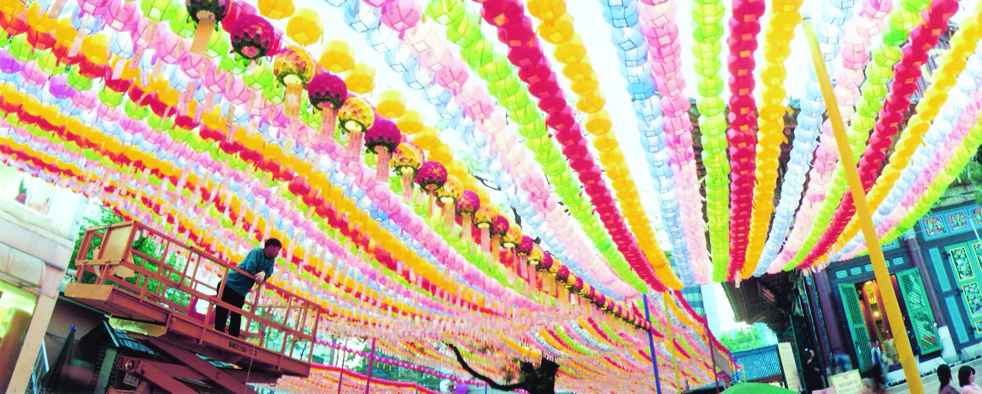 Colorful lanterns display at a cultural event, vibrant and festive, showcasing traditional ceramic lantern decorations during celebrations.
