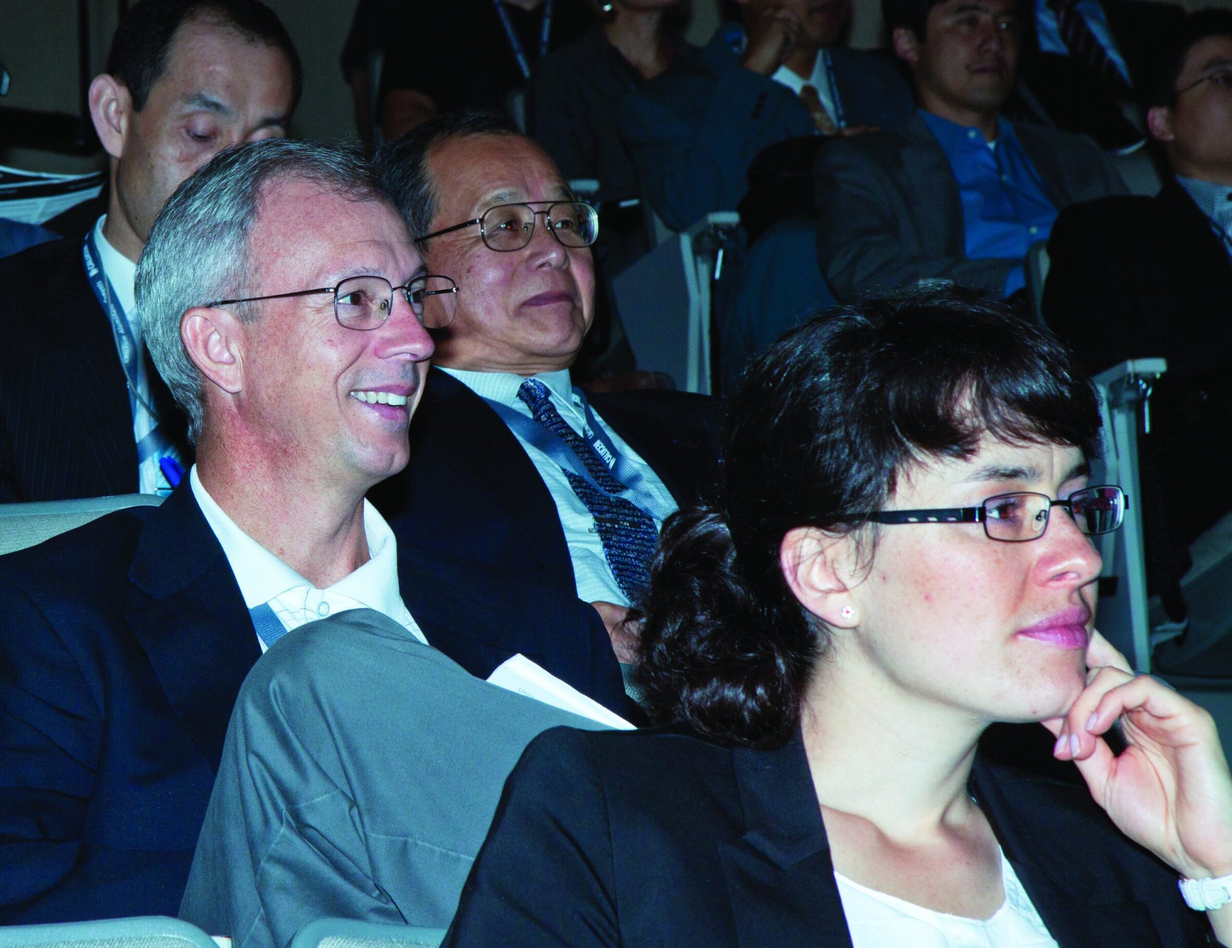 Innovative ceramics conference attendees listening attentively at ACerS Bulletin event.