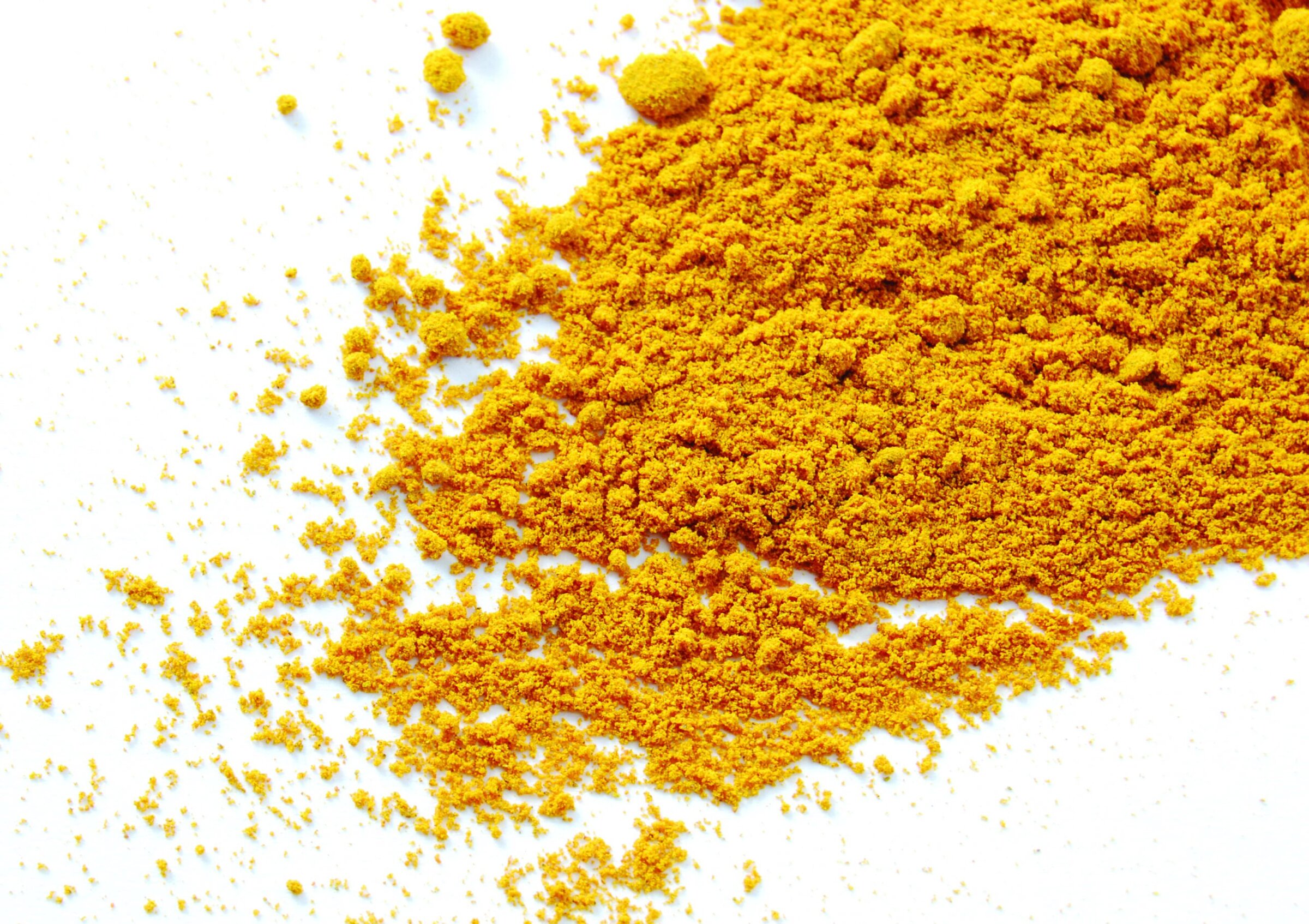 yellow powder against a white background