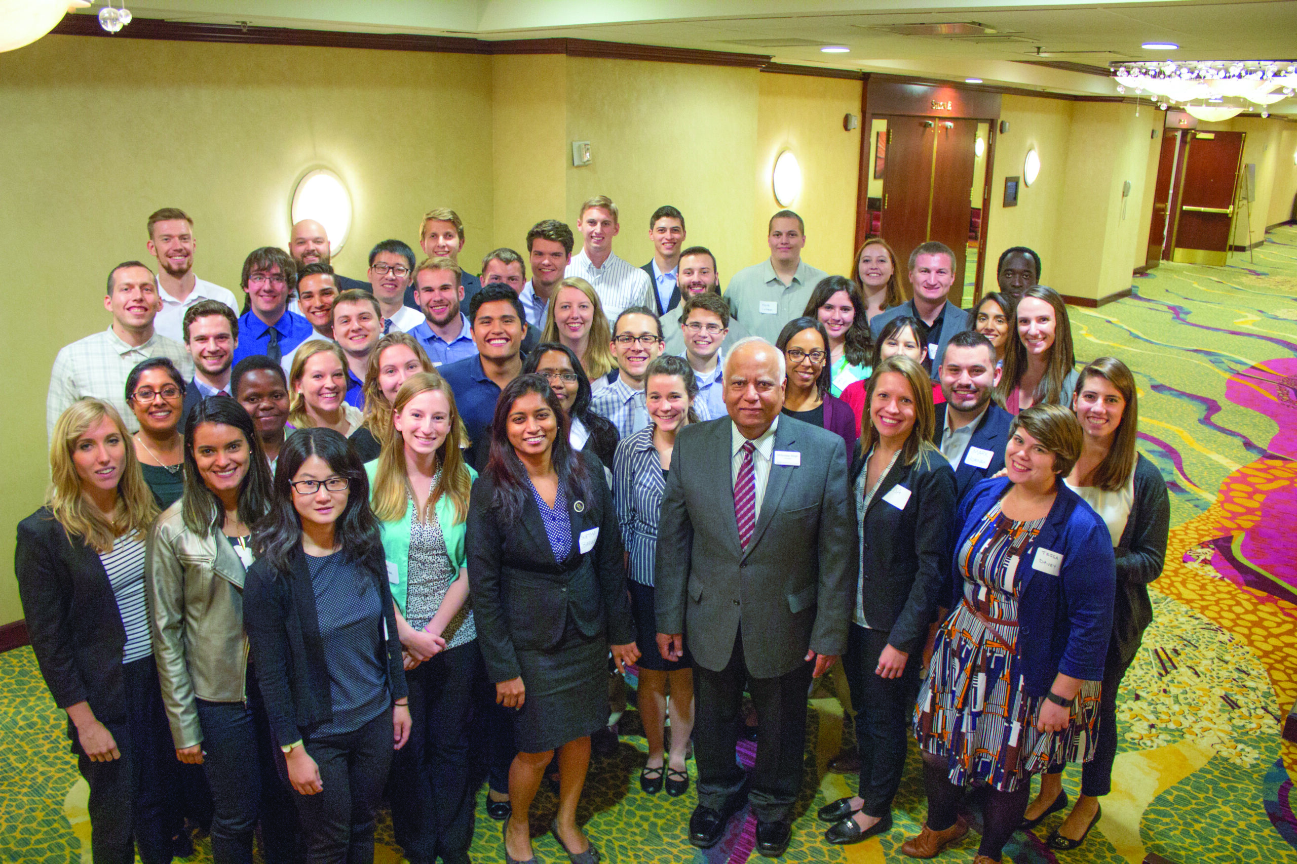 Group shot of students at a conference.