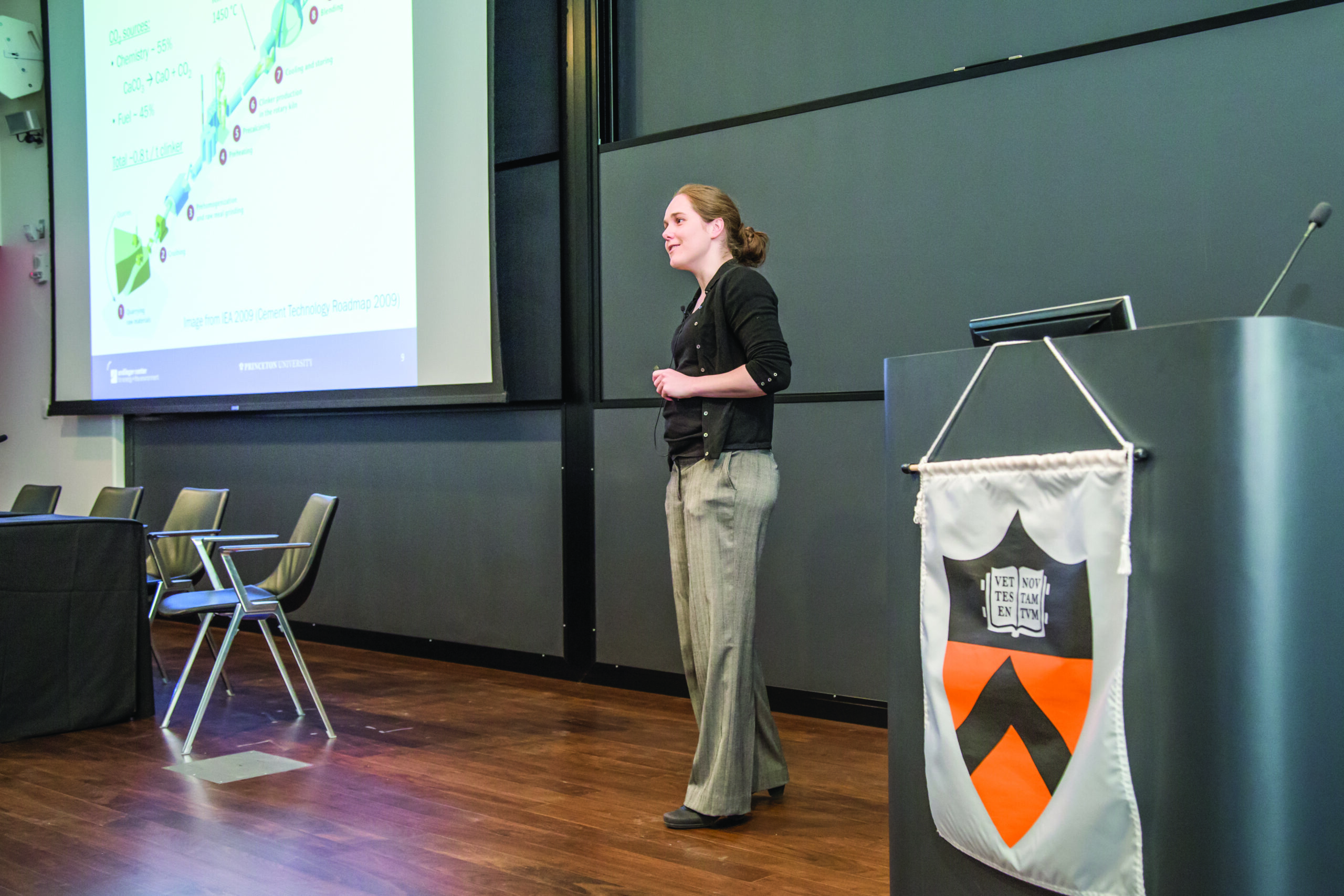 Woman giving a speech in a college classroom