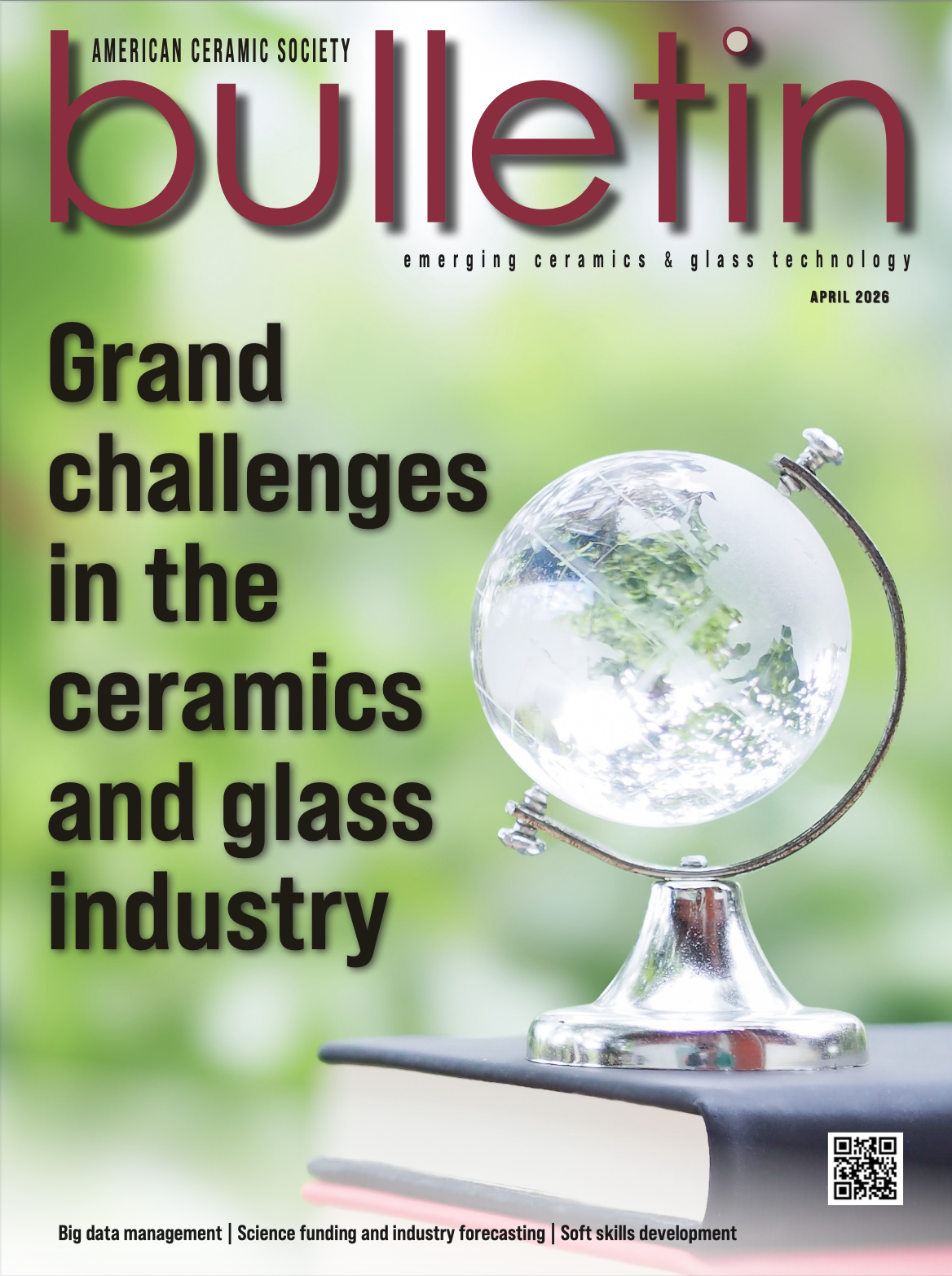 Cover of the April 2023 ACerS Bulletin featuring a glass globe on a stand with a blurred green background.